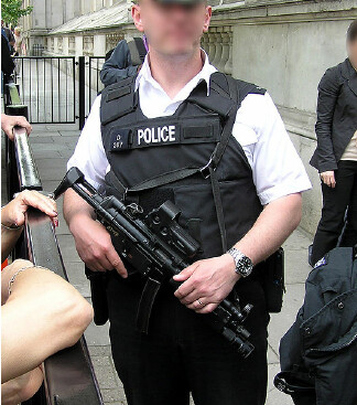 MP5-sub-machine-gun-worn-by-an-English-Police-officer-outside-Parliament-London-287
